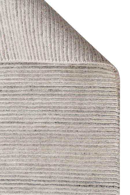 Vog Hali Siena Silver is a living room rug meticulously crafted using hand-weaving techniques, made from a natural bamboo and wool blend. - MALLTURK