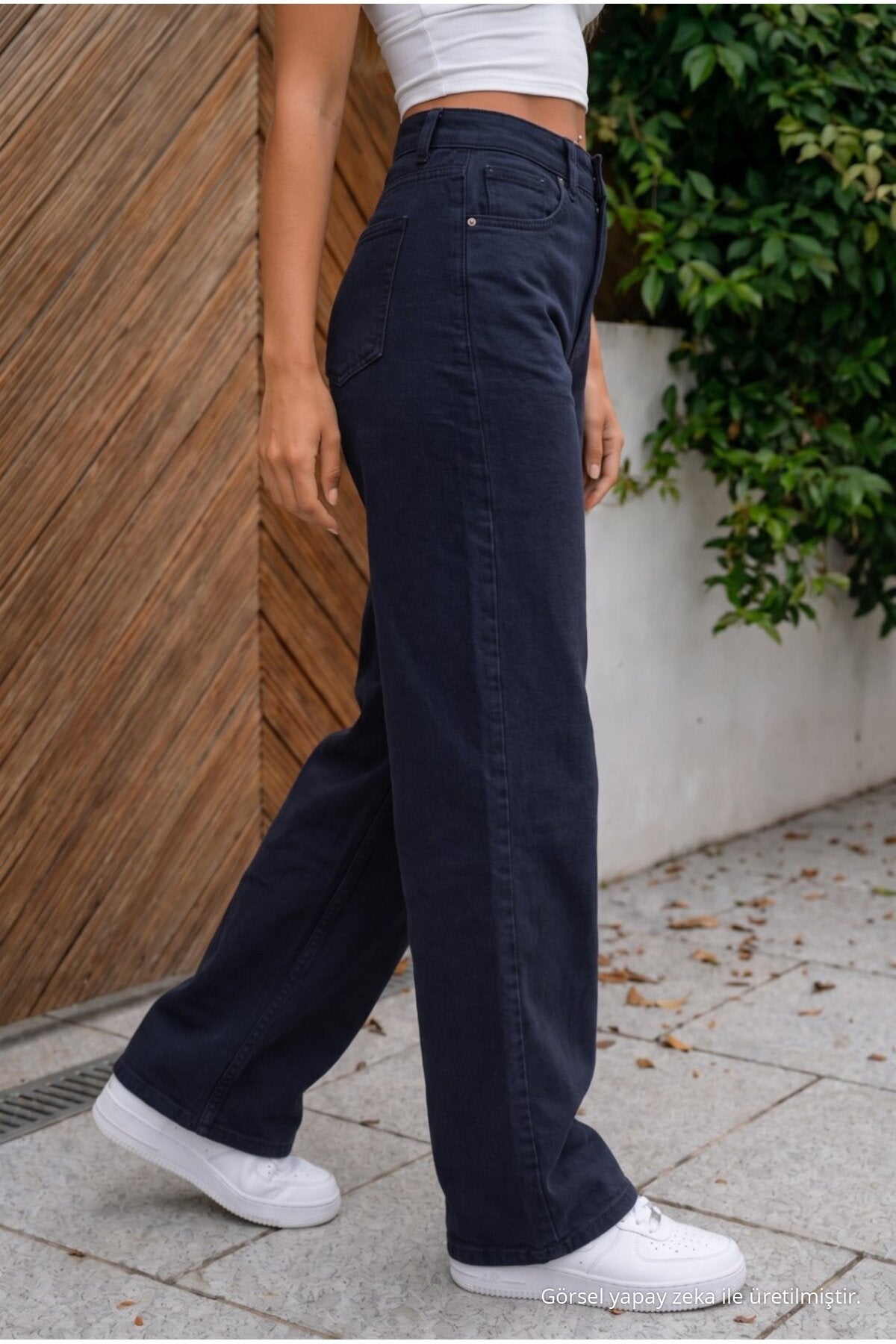 High-waisted, wide-leg, loose-fitting, stretchy palazzo jeans in dark navy. - MALLTURK