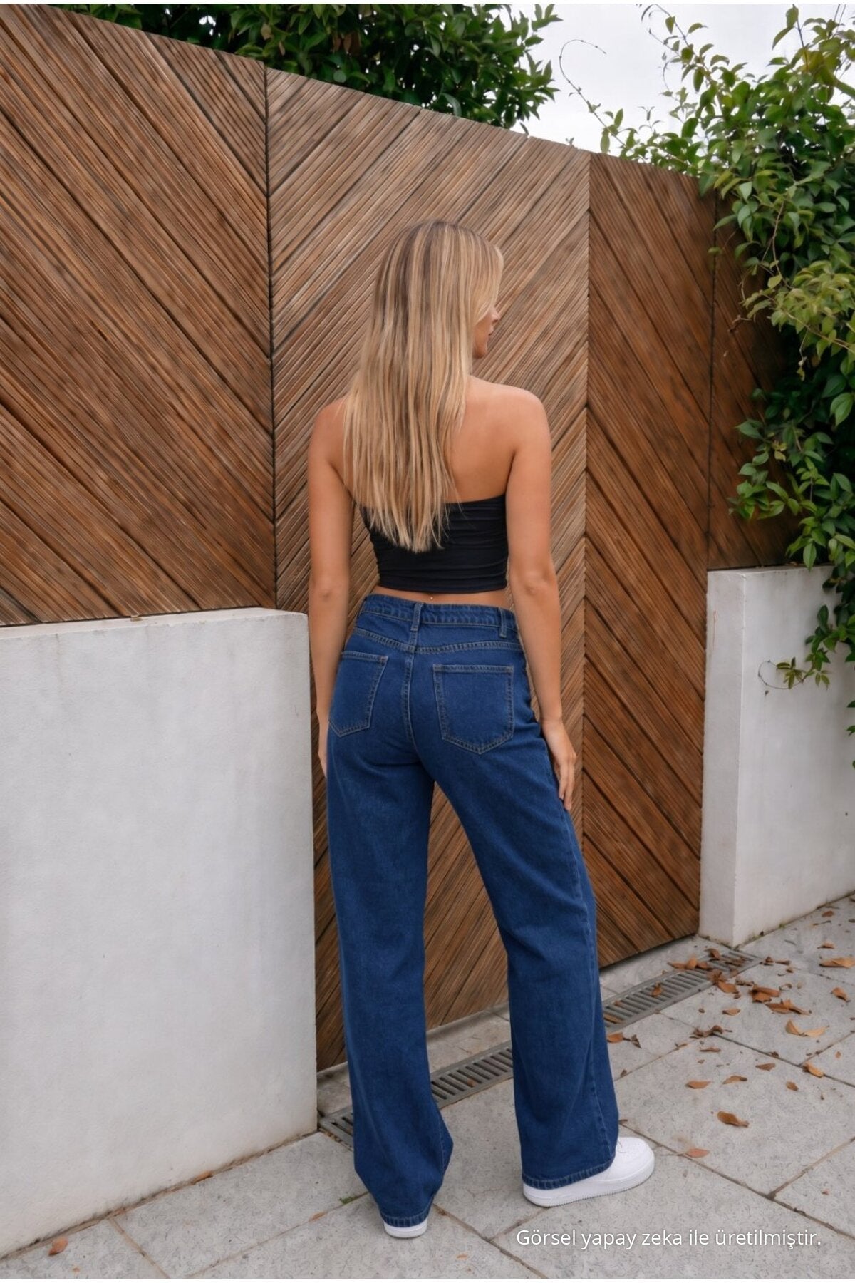 High-waisted, wide-leg, loose-fitting, stretchy palazzo jeans in navy blue. - MALLTURK
